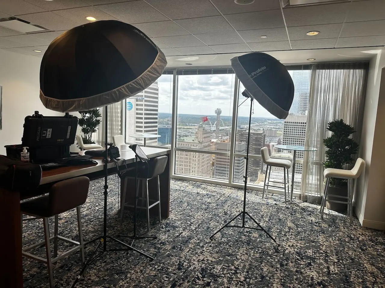 Professional portable headshot lighting set up inside an office for an onsite corporate session